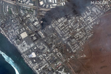 Satellite view of black billowing smoke from wildfire