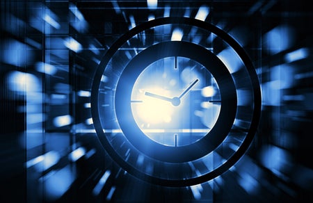 Time abstract clock face with blue motion background.