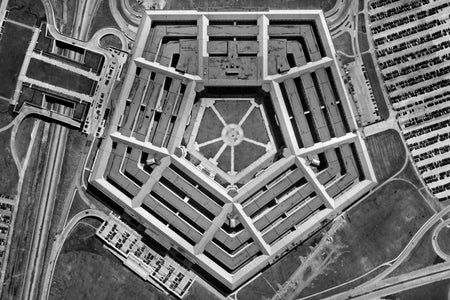 View from directly above the United States Department of Defense's Pentagon Building in a 1950s black and white aerial photograph